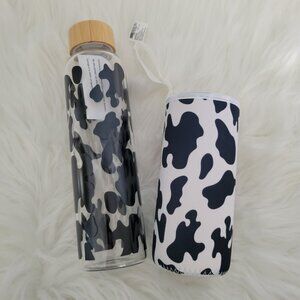 Claire's Cow Print Glass Water Bottle with Sleeve